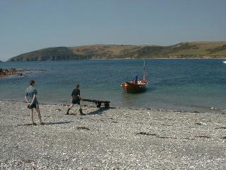 helpers greet boat