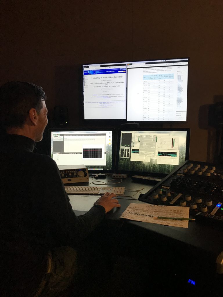 A picture containing text, indoor, computer, person

Description automatically generated